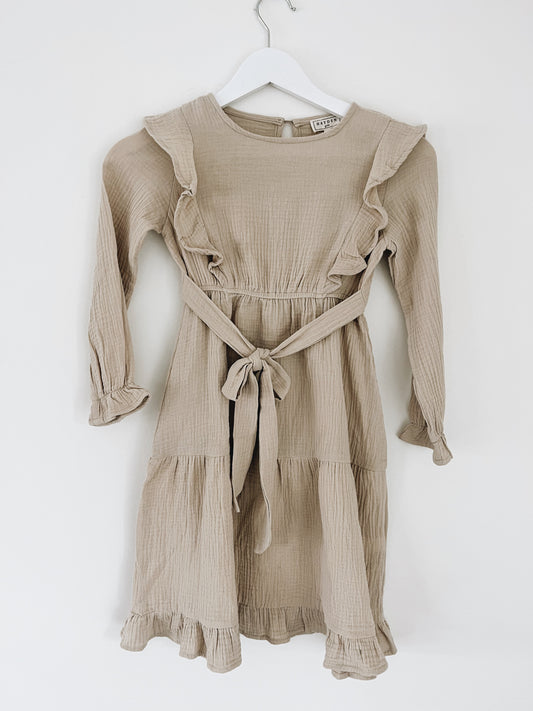 natural beige ruffle dress with tie belt flowing comfortable ruffles on end of sleeve bottom of skirt